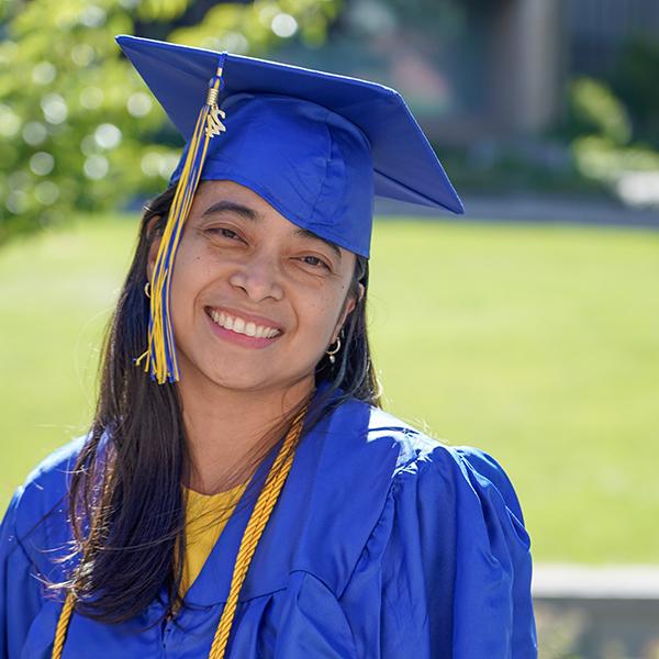 grad in blue regalia